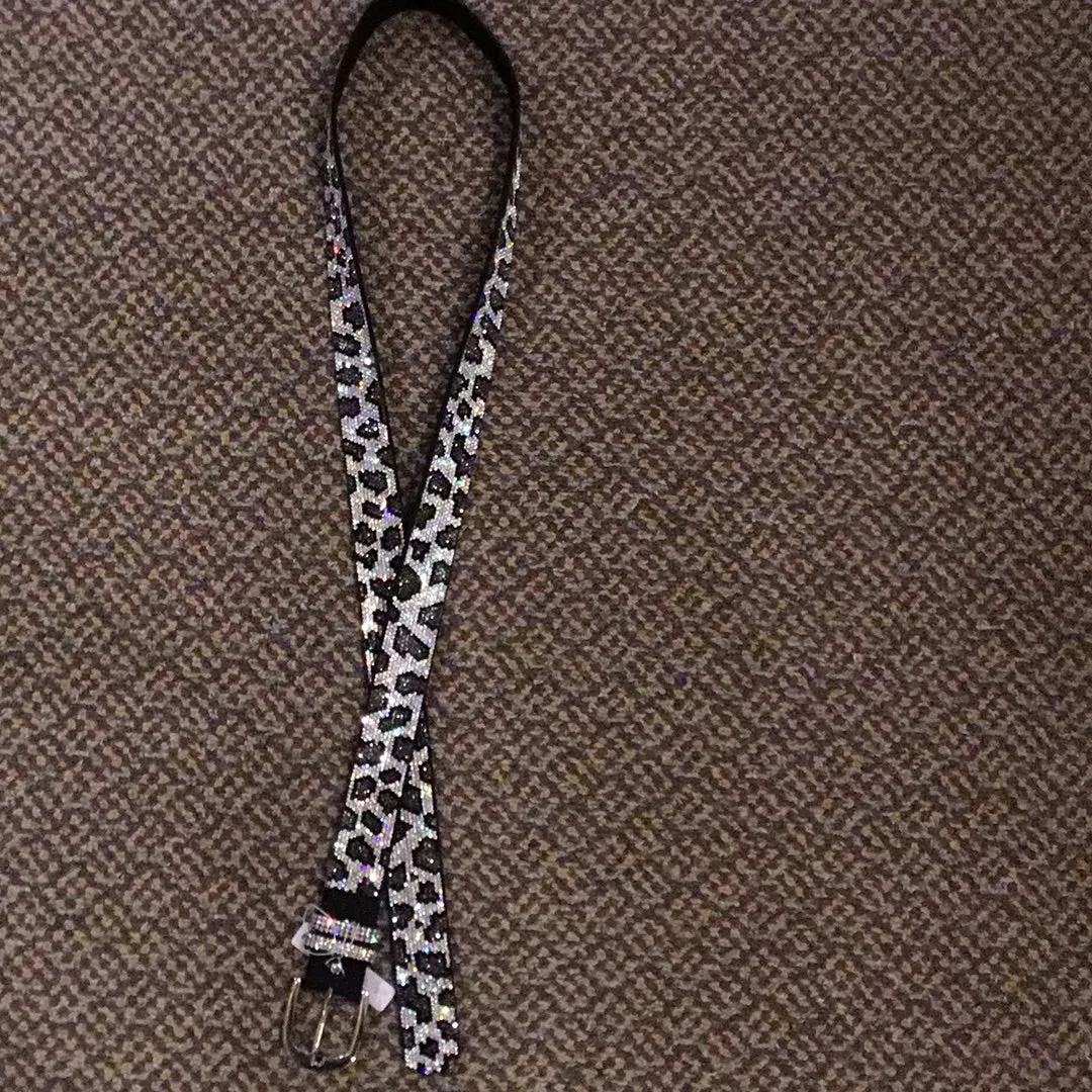 Jacqueline Kent bling belts snow leopard